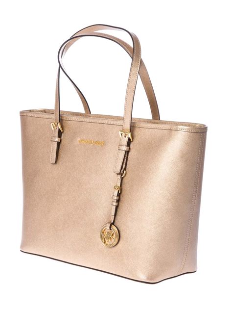 bolsa dorada michael kors|bolsos michael kors.